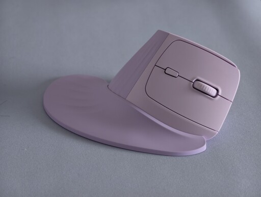 purple vertical mouse with a wrist rest attached to the side